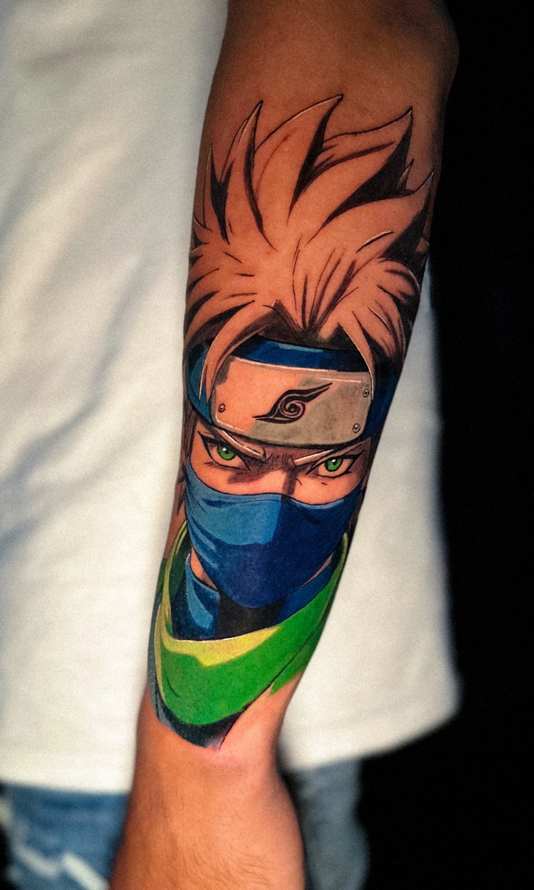 Color anime forearm piece of a masked warrior by Ramón Santiago at R INKS ARTS