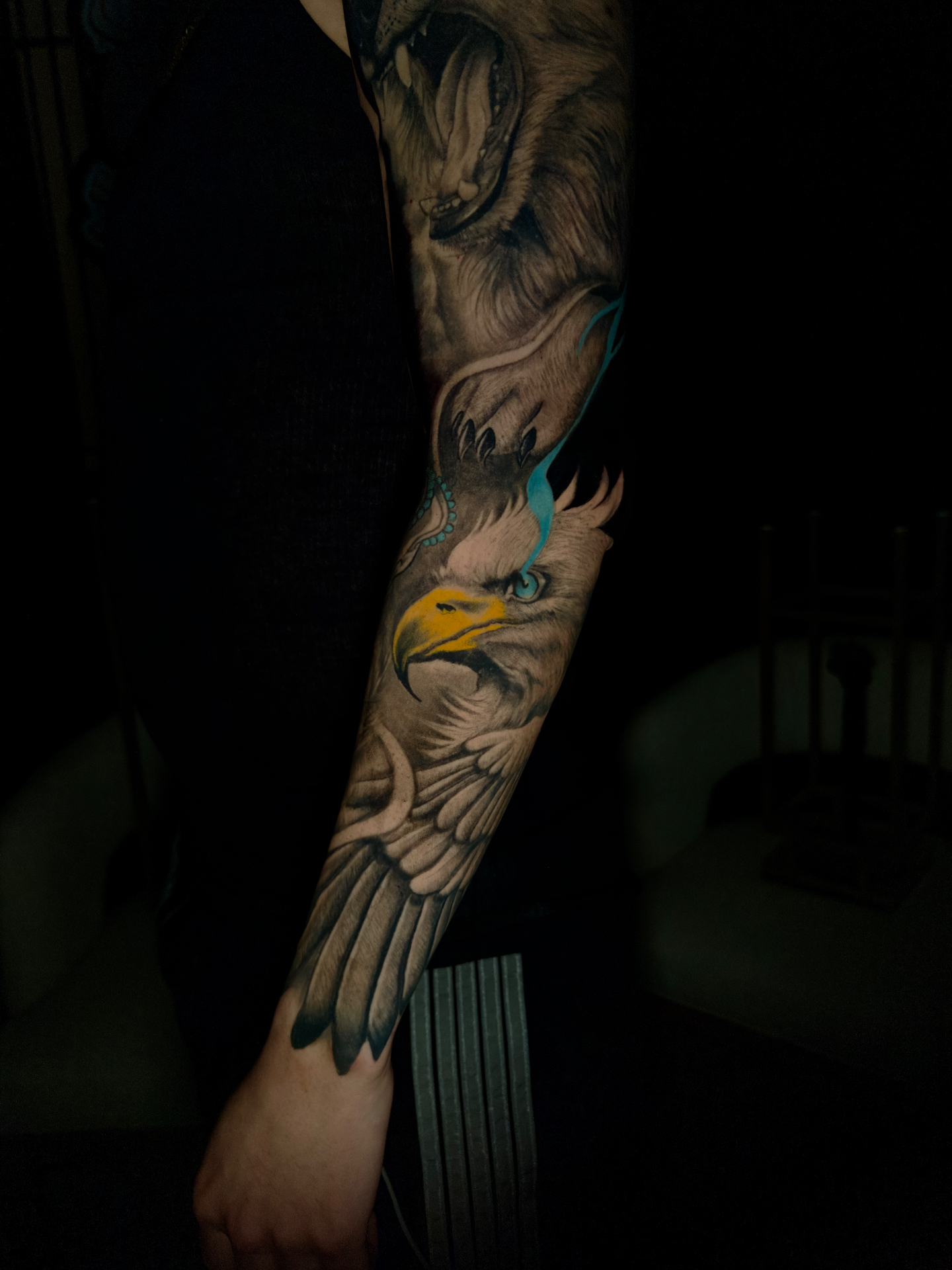 Full-sleeve tattoo featuring a detailed eagle with a roaring bear, by Ramón Santiago at R INKS ARTS in Bayamón, Puerto Rico