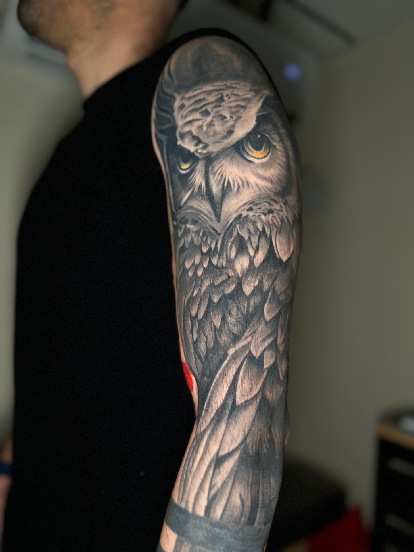 Black and grey owl half sleeve tattoo by Ramón Santiago at R INKS ARTS in Bayamón