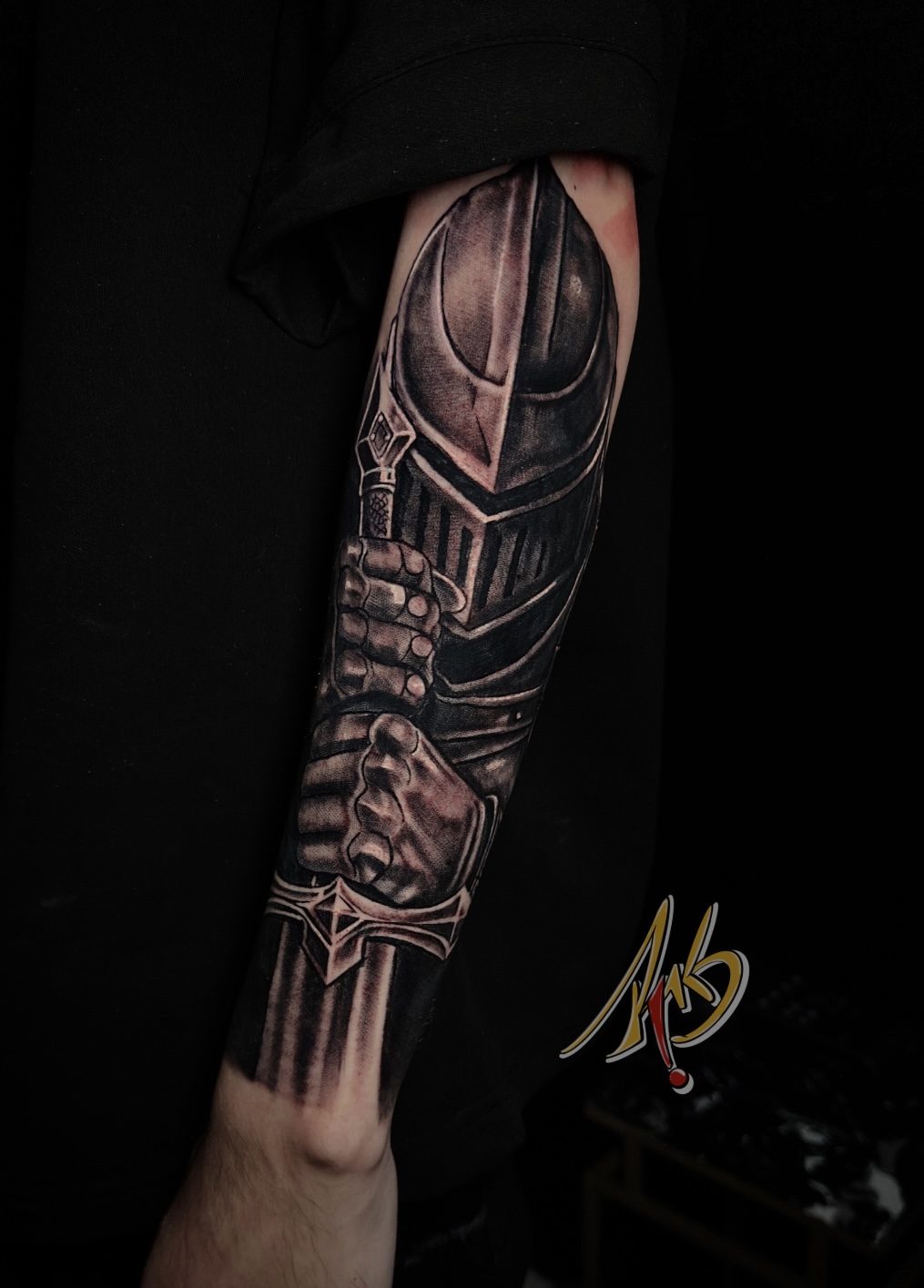 Black and grey armored warrior tattoo by Ramón Santiago at R INKS ARTS in Bayamón