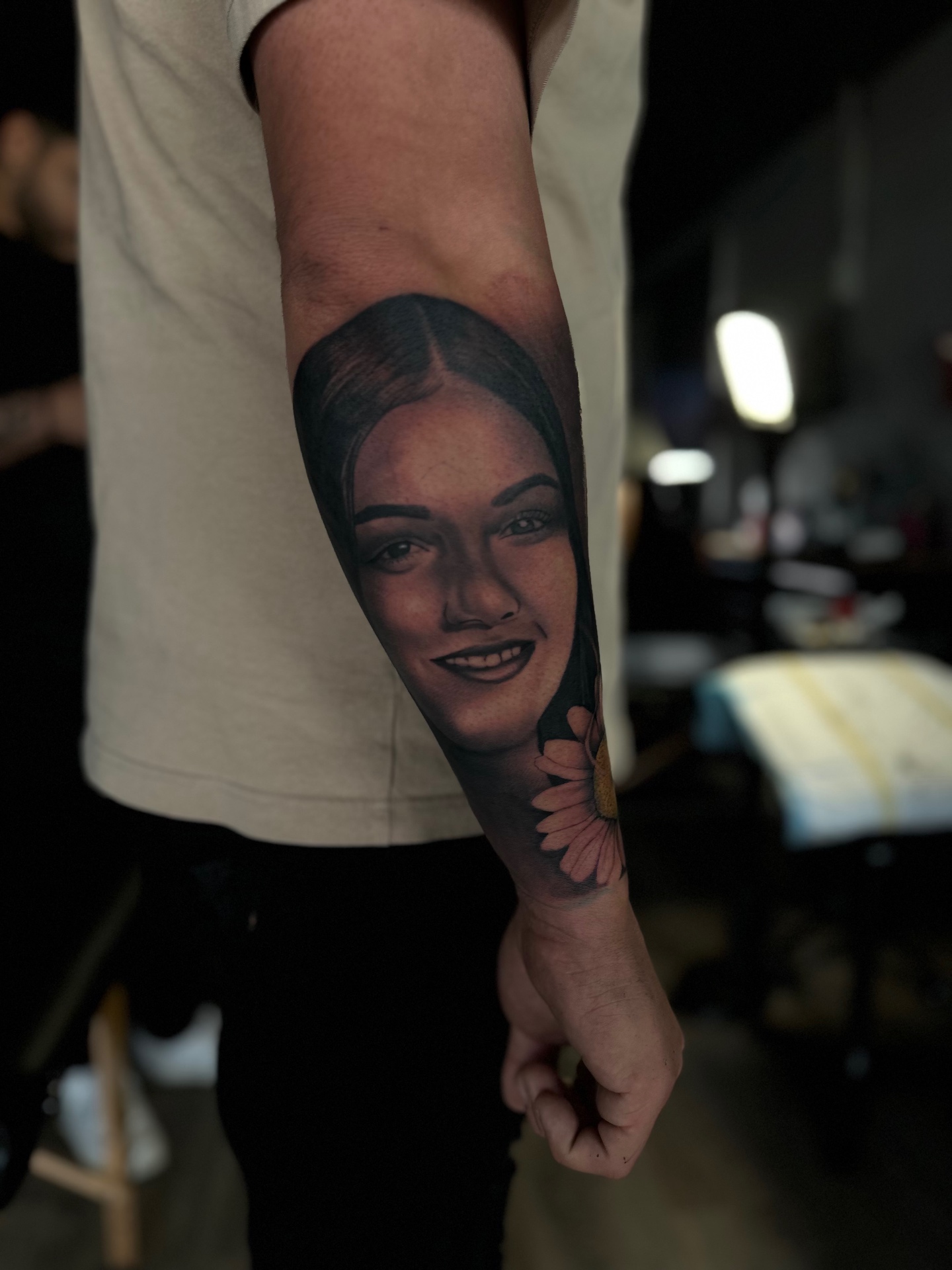 Realistic portrait tattoo of a woman by Ramón Santiago at R INKS ARTS in Bayamón