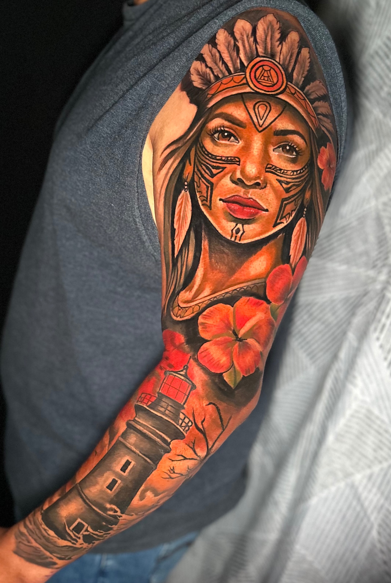 Color realism sleeve featuring a portrait, flowers and lighthouse by Ramón Santiago at R INKS ARTS